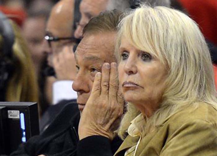 Donald Sterling and his wife Rochelle watch the Clippers play the San Antonio Spurs in Los Angeles in 2012. An attorney representing Rochelle has said that she will fight to retain her 50 percent ownership stake in the team.