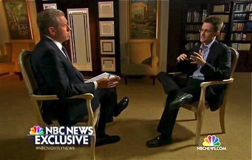 In this image taken from video provided by NBC News, Edward Snowden, a former National Security Agency contractor, right, speaks to NBC News anchor Brian Williams.