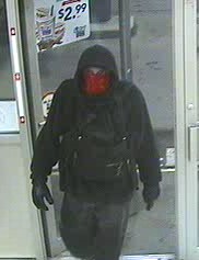 Contributed photo AT LARGE: The suspect was wearing a red bandanna and a hooded overcoat.
