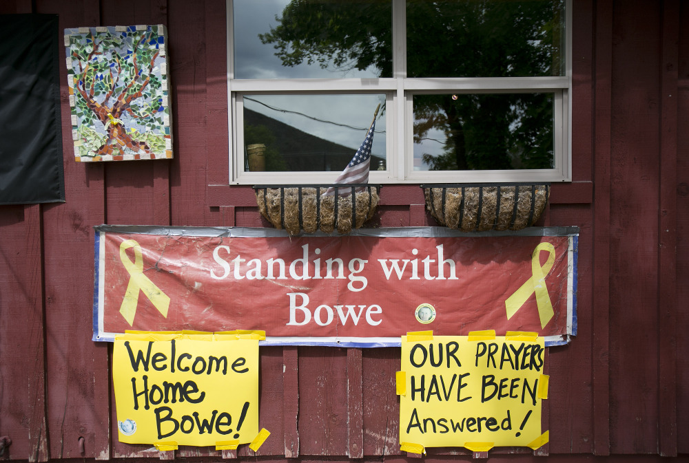 Signs celebrating U.S. Army Sgt. Bowe Bergdahl’s release hang on the front of Zaney’s coffee shop in Hailey, Idaho, his hometown, on Saturday.
