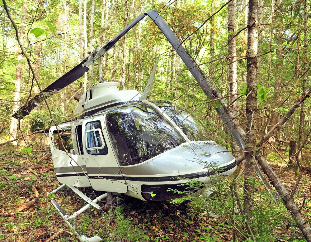 HELICOPTER CRASH: Investigators are still trying to determine what caused a helicopter to crash Friday in the woods in Whitefield.