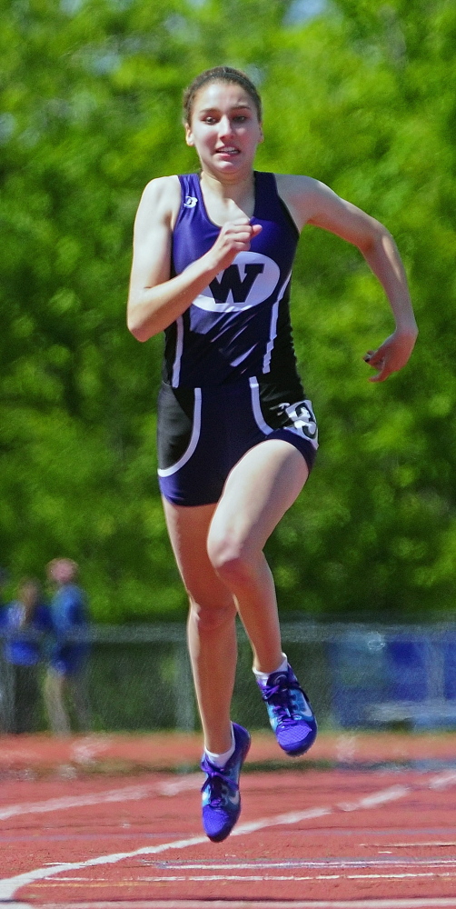 Ready, set, go: Waterville sprinter Lydia Roy runs toward the 200 meter dash finish line during the KVAC track meet.