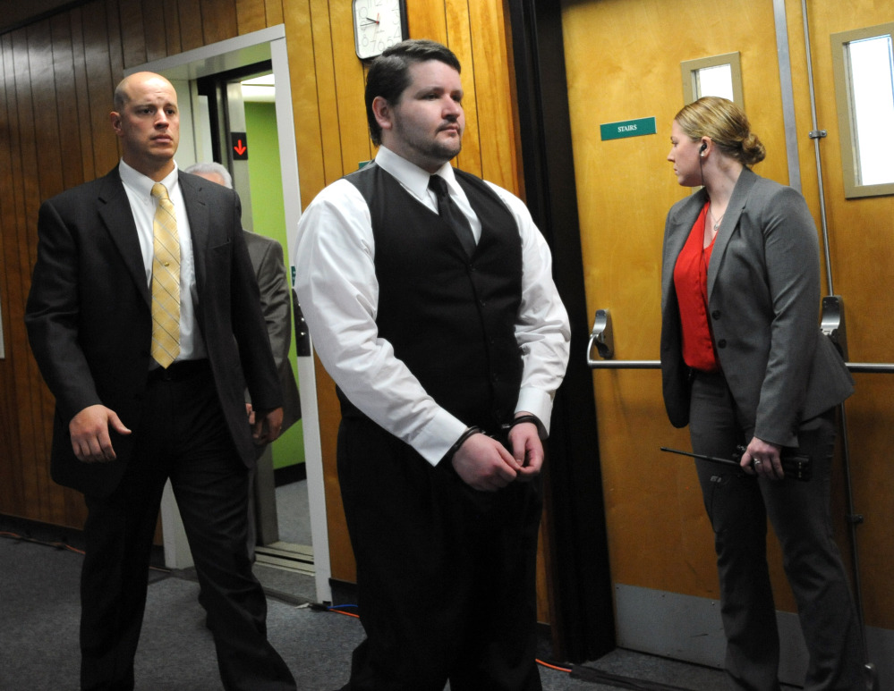 The Associated Press Seth Mazzaglia is escorted into the courtroom at Strafford County Superior Court in Dover, N.H., on Friday. He is charged with first-degree murder in the October 2012 slaying of 19-year-old Elizabeth “Lizzi” Marriott’s of Westborough, Mass.