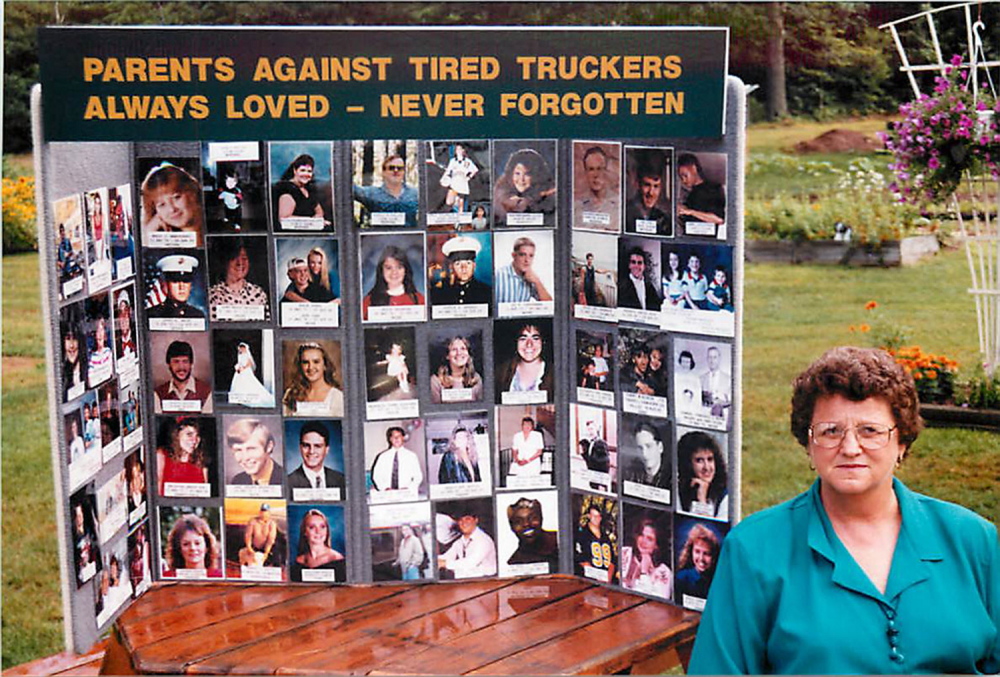 trucksafety.org TIRED TRUCKERS KILL: Daphne Izer of Lisbon poses beside a collage of photos of young adults who have been killed by tired truckers. Izer’s son, Jeff, was killed Oct. 10, 1993, when the car in which he was riding was crushed by an 80,000-pound tractor-trailer, the driver of which had fallen asleep at the wheel. Later, Izer and her husband, Steve, formed Parents Against Tired Truckers to lobby for stricter sleep rules for truckers and to support the families who suffered similar losses.