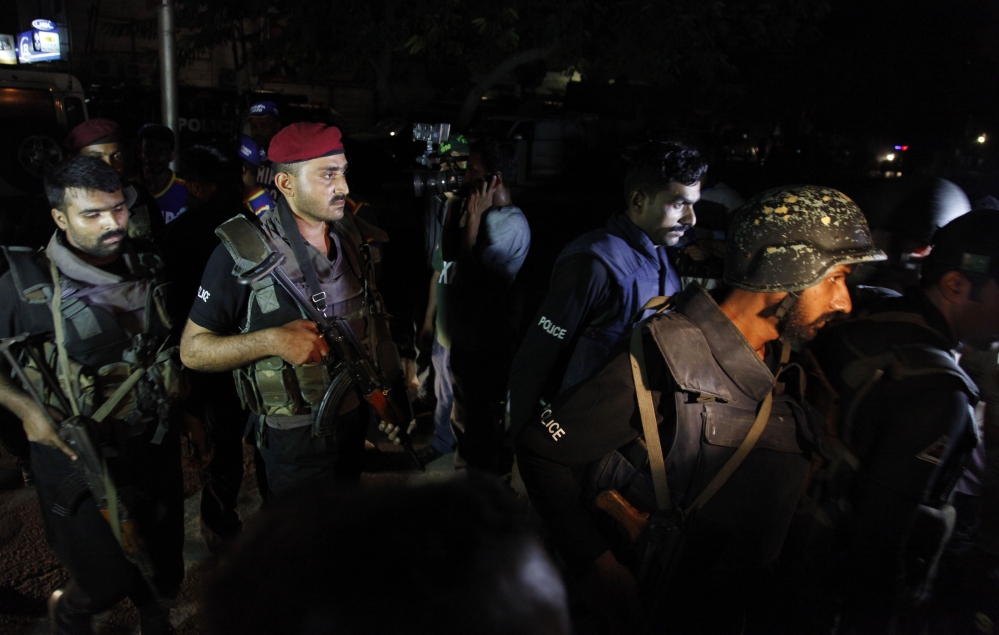 The Associated Press Pakistani commandos get ready to enter Karachi airport terminal following attacks by unknown gunmen on Sunday night, in Pakistan. Gunmen stormed an airport terminal used for VIPs and cargo in Pakistan’s largest city on Sunday night, killing and wounding scores of people, officials said.