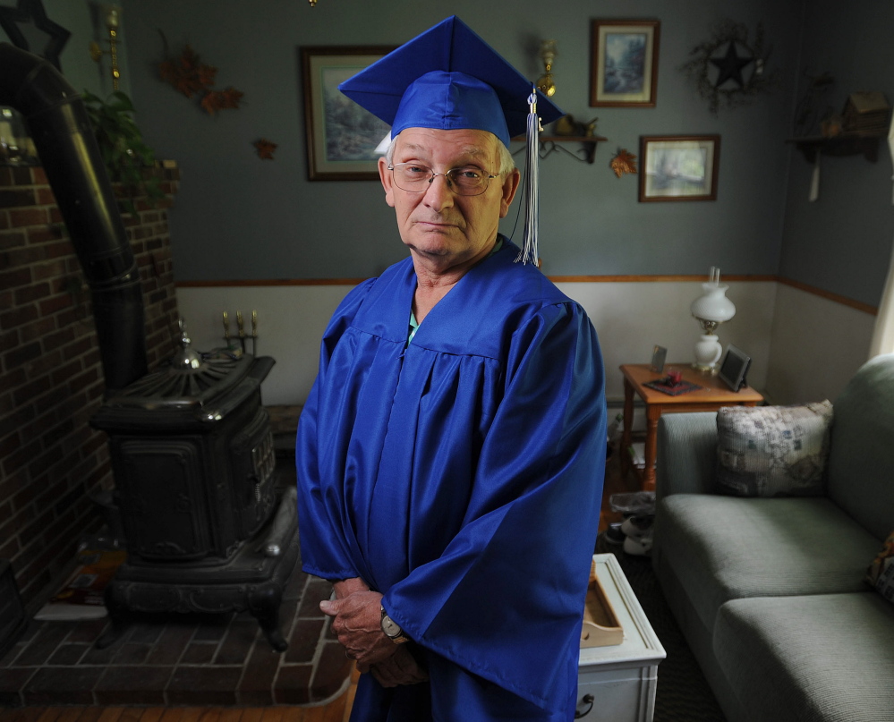 Staff photo by Michael G. Seamans Earned it: Rick Soule, 72, poses for a portrait in his living room at home on Norridgewock Road in Fairfield on Friday. Soule will receive a high school diploma that was 50 years in the making from the Lawrence High School Adult Education program on Wednesday.