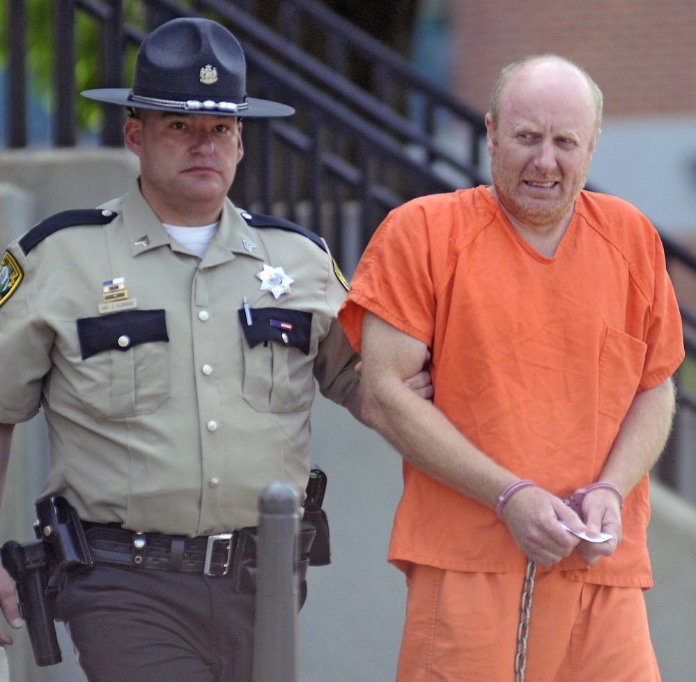 Staff photo by Andy Molloy 
 MURDER CHARGES: Roland Cummings, 44, appeared in Kennebec County Superior Court Monday.