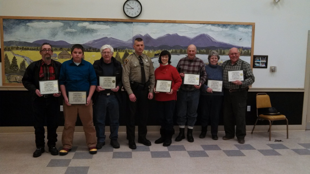 Citizen Police Academy graduates: From left are Michael Steward, Merrill Steward, John Tompkins, Corporal Christopher Chase, Sally Iverson, Neil Iverson, Jo Craemer and Ray Craemer.