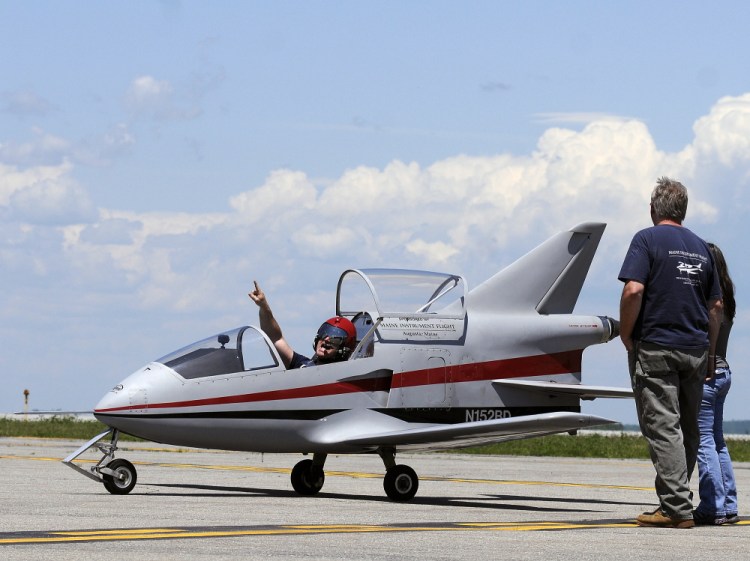 UP UP AND AWAY: Pilot Peter Reny of Augusta taxis Monday on the tarmac of the Augusta State Airport before taking off in his Bede-BD5 microjet.