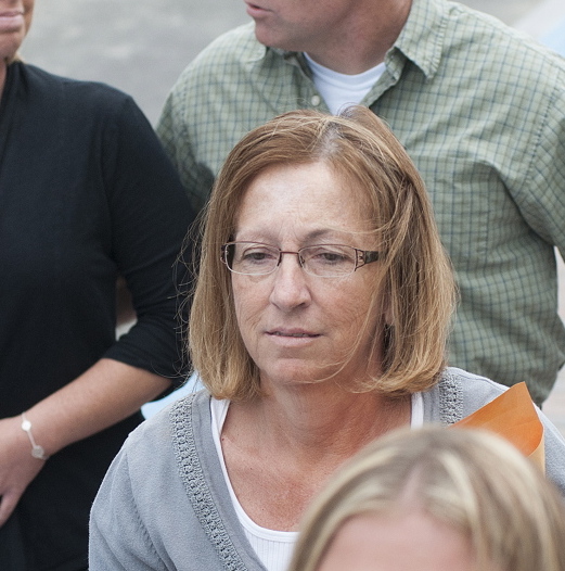 Sentenced: Carole J. Swan, former Chelsea selectwoman, with her son John Swan, as they enter the U.S. District Court building in Bangor Friday for her sentencing hearing on extortion, tax fraud and workers compensation fraud.