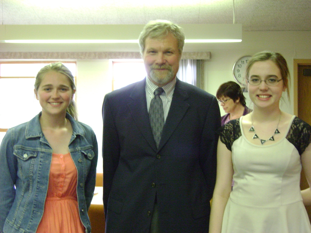 From left are Kathryn Wright, Michael Szela, MD, president of Kennebec County Medical Society, and Alyx Wharton.