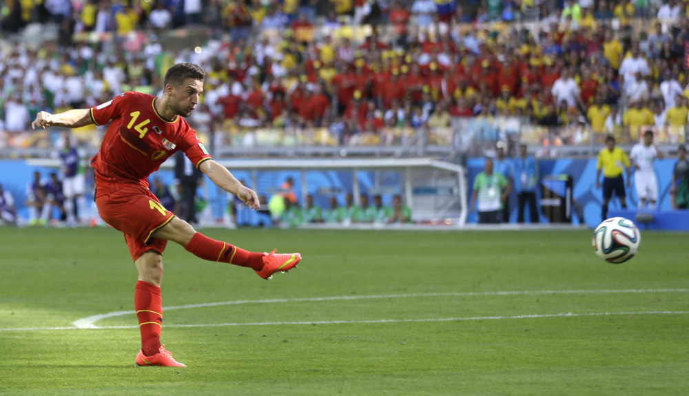 Belgium’s Dries Mertens scores his side’s second goal during the group H World Cup soccer match between Belgium and Algeria in Belo Horizonte, Brazil, on Tuesday.