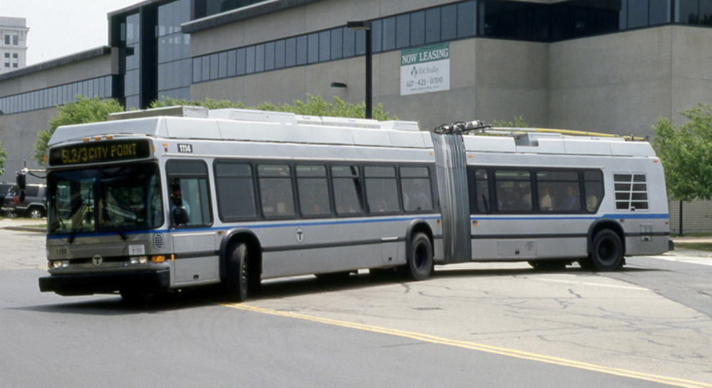 A Massachusetts Bay Transit Authority Dual Mode Articulated NEOPLAN bus is similar to ones that will be refurbished by the Maine Military Authority.