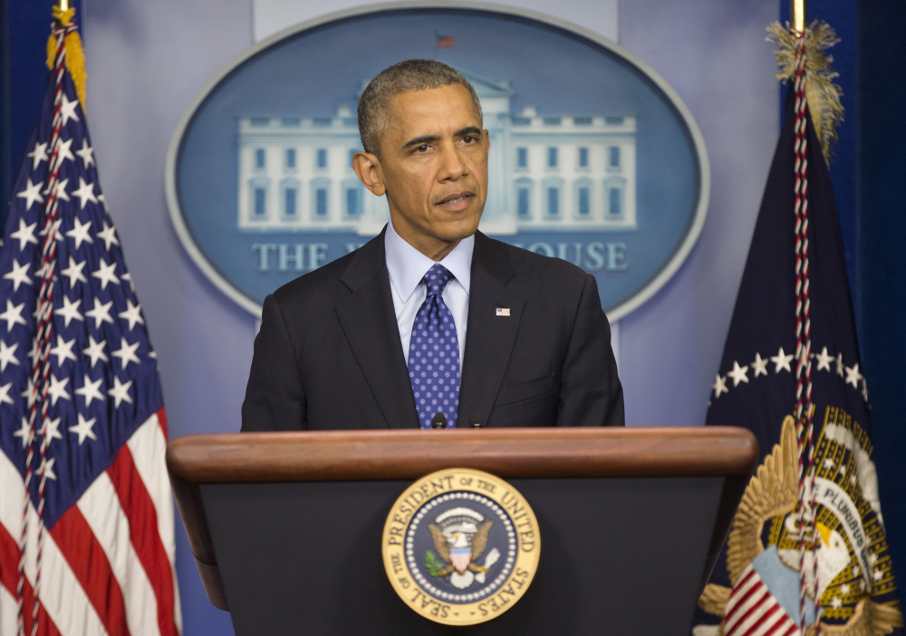 President Barack Obama speaks to members of the media about the situation in Iraq on Thursday at the White House.
