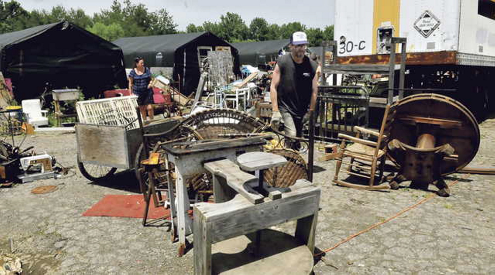 UNDER PRESSURE: Robert Dale on the grounds of his Maine 201 antique store in Fairfield earlier this month. Dale missed a court-ordered June 15 deadline to clean the property.