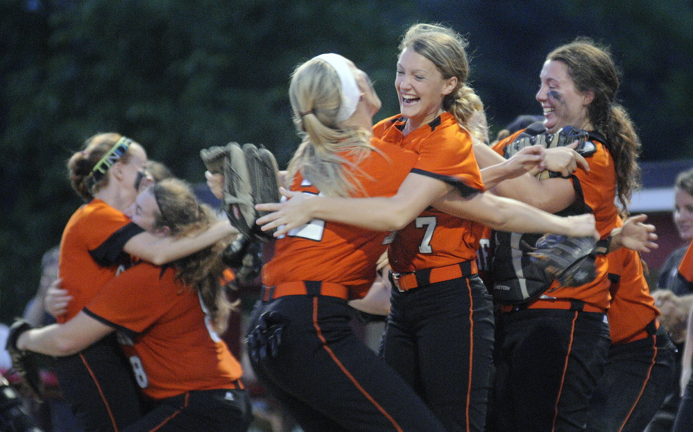 ONE MORE WIN: The Skowhegan softball team will hope to have this same sort of celebration today when the Indians play Thornton Academy for the Maine Class A softball state championship.