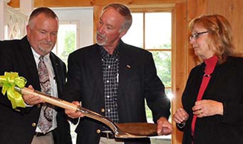 Capital campaign celebration: Mac Cianchette, left, receives ceremonial shovel from Mike Gallagher, center, and Terri Vieira at the Sebasticook Valley Health Center capital campaign finale event in Palmyra