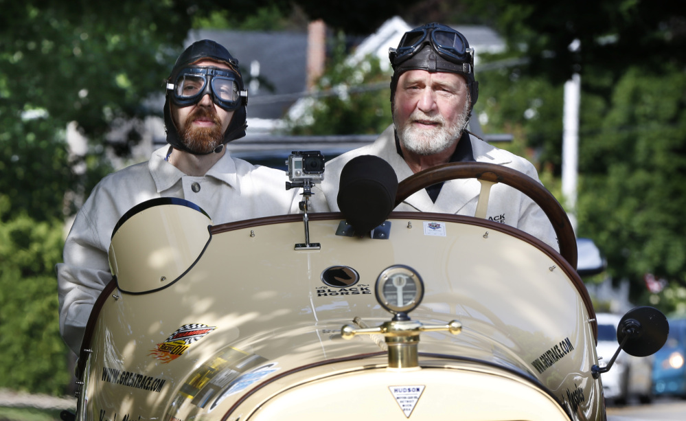 Navigator Chris Clark, left, of Ansonia, Conn., and driver Frank Buonanno of Newtown, Conn., take part in the Great Race on Saturday. Participants left Maine Saturday morning on a nine-day road rall  to Florida. The event, which launched in 1983, is a time/speed/distance rally with each driver and navigator being judged on how well they follow precise instructions that detail every move down to the second.
