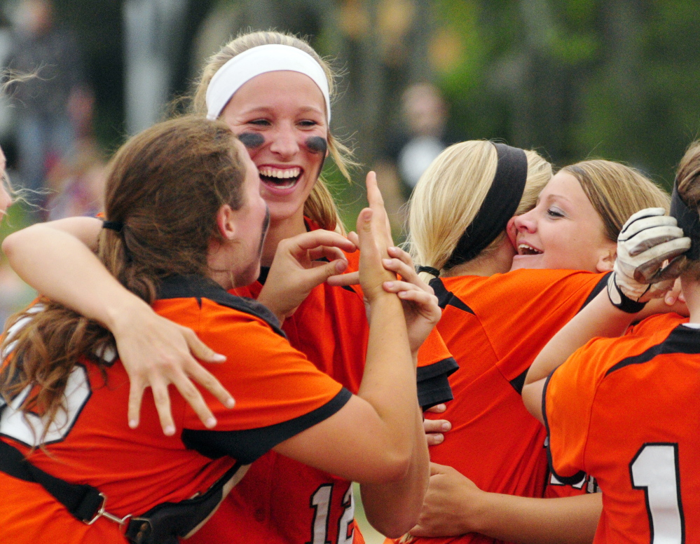 Celebration: Skowhegan players celebrate after beating Thornton Academy 7-2 to win Class A softball state championship on Saturday on Bailey Field in Standish.