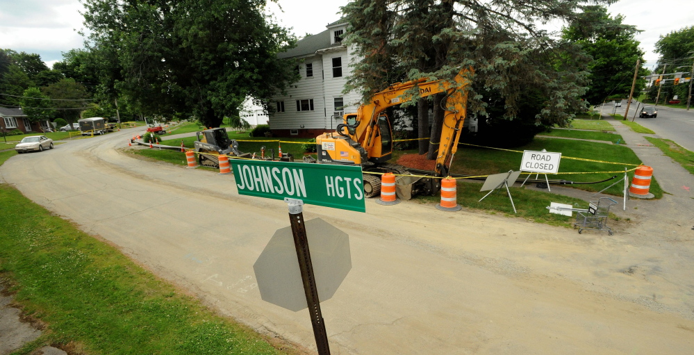 Construction of a natural gas pipeline is making its way through Johnson Heights in Waterville, shown Saturday.