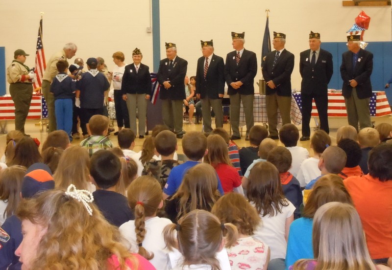 Students at Carrie Ricker School participate in a Flag Day Ceremony.