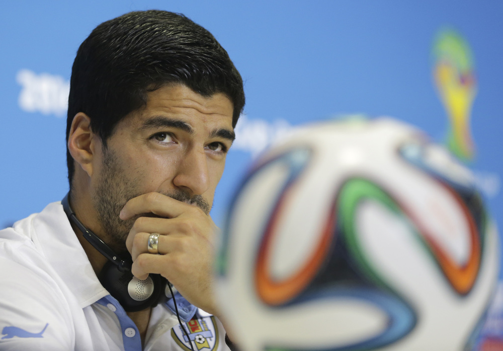 Uruguay’s Luis Suarez listens to a question during a news conference at the Arena das Dunas in Natal, Brazil, on Monday.