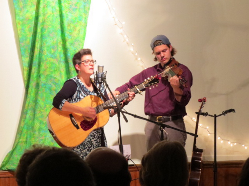 Ruth Hill, left, and Silas Rogers performing at the Chesterville Center Union Meeting House fundraiser recently.