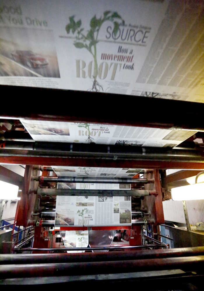 The first installment of Source rolls off the presses on April 3 at the MaineToday Media’s printing plant in South Portland. The new section is one of many changes that are underway with the business.