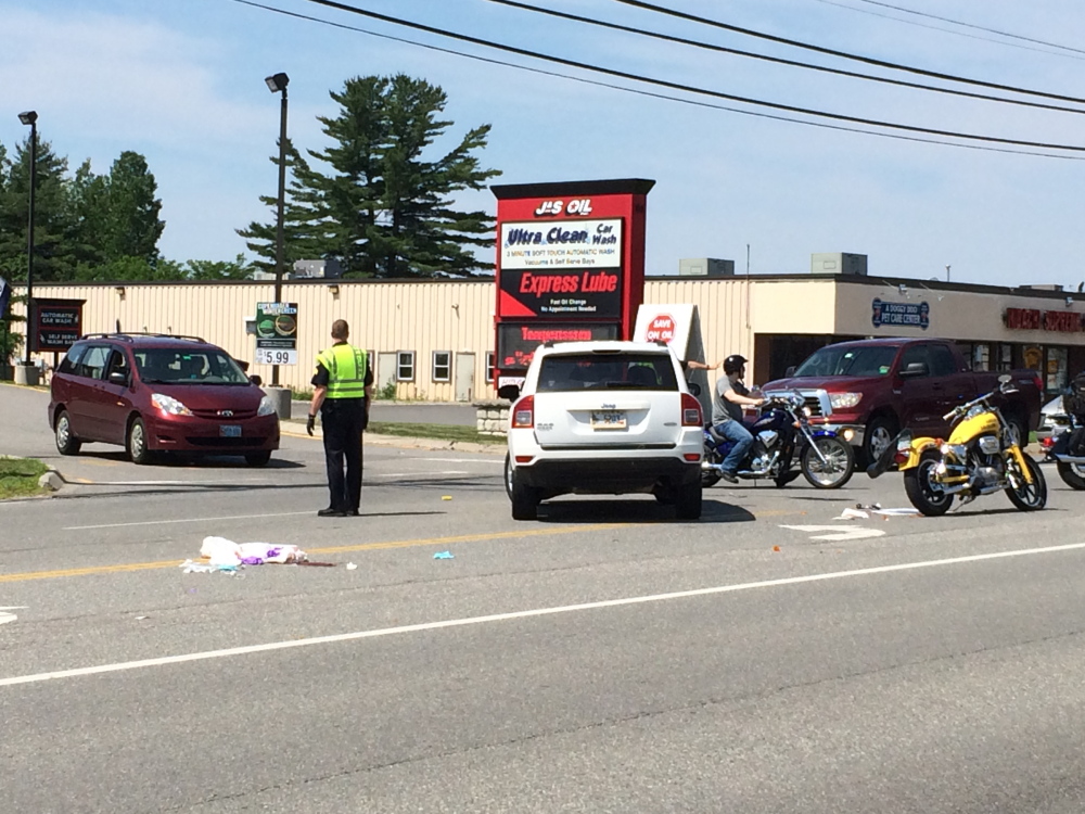 A motorcyclist was taken to the hospital by ambulance for a head injury following a collision with a Jeep outside J&S Oil on Kennedy Memorial Drive on Saturday.