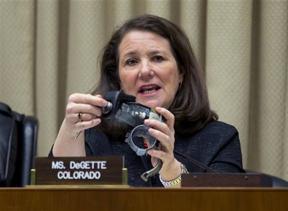 Rep. Diana DeGette, D-Colo., holds up a GM ignition switch while she questions General Motors CEO Mary Barra on Capitol Hill in Washington in April. DeGette, the ranking member of the House committee investigating GM’s recall of 2.6 million small cars, wants General Motors to explain how it plans to fix what’s been described as a lax corporate culture and how the company plans to compensate victims of crashes tied to faulty ignition switches.