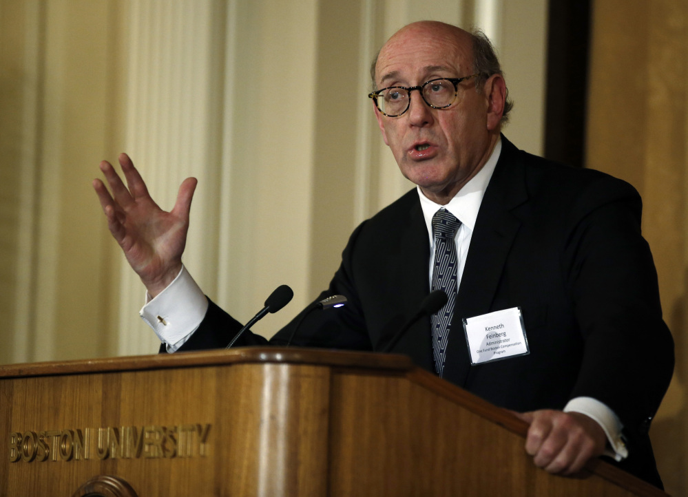 In this March 24, 2014, file photo, Kenneth Feinberg, administrator of the One Fund Boston Compensation Program, speaks at a forum at Boston University in Boston. Feinberg said there is no limit on the total amount he can pay people harmed in crashes caused by faulty General Motors ignition switches.
