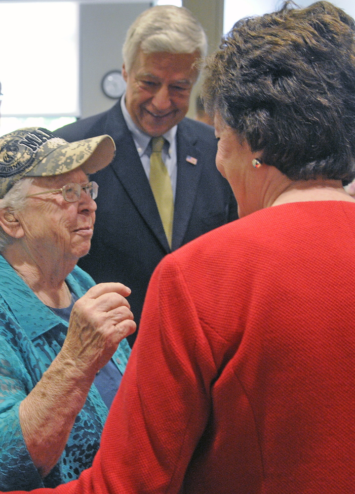 Marine Corps veteran Ruby Gilmore, 83, greets U.S. Rep. Mike Michaud and U.S. Sen. Susan Collins Monday at the women’s xlinic at VA Maine Healthcare Systems-Togus during the grand opening.