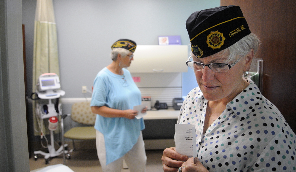 Brenda Confer, right, and Mona Naragon inspect an exam room Monday at the women’s clinic at the VA Maine Healthcare Systems-Togus.  The veterans, both residents of Lisbon, were on hand for the grand opening.