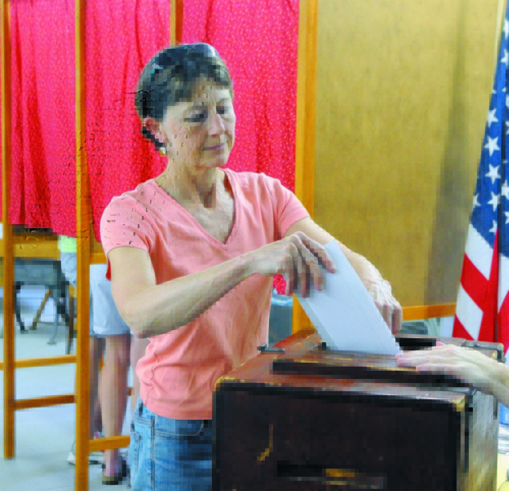 Staff file photo by Joe Phelan Town Meeting: Fayette residents will decide June 14 whether to continue to maintain Starling Hall, which has been used as a polling place.