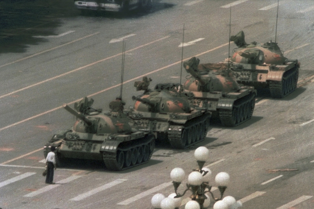 AP file photo A MAN ALONE: In this June 5, 1989, file photo, a Chinese man stands alone to block a line of tanks heading east on Beijing’s Changan Boulevard from Tiananmen Square in Beijing. A quarter-century after the Communist Party’s attack on demonstrations centered on Tiananmen Square on June 4, 1989, the ruling party prohibits public discussion and 1989 is banned from textbooks and Chinese websites.