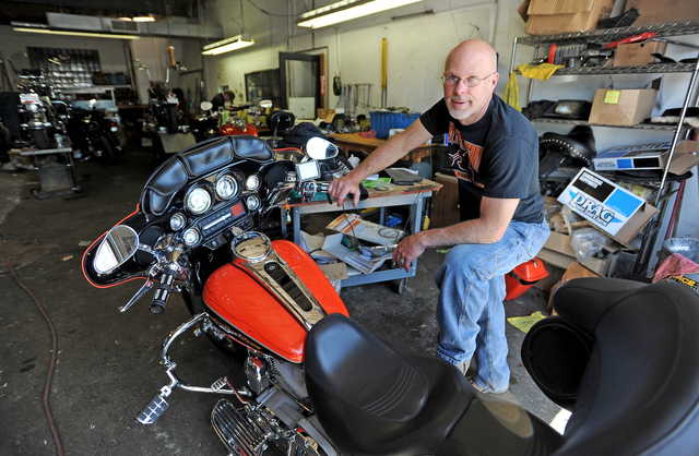 QUIETER BIKES: David Lefebvre, owner of the Starting Line on College Avenue in Waterville stands in his repair garage on Thursday. Lefebvre is in favor of excessive exhaust noise regulations. 