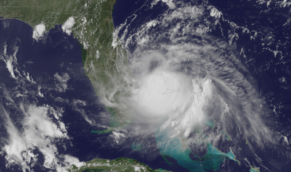 A satellite image released by the National Oceanic and Atmospheric Administration shows the center of Tropical Storm Arthur off the east coast of Florida on Tuesday.