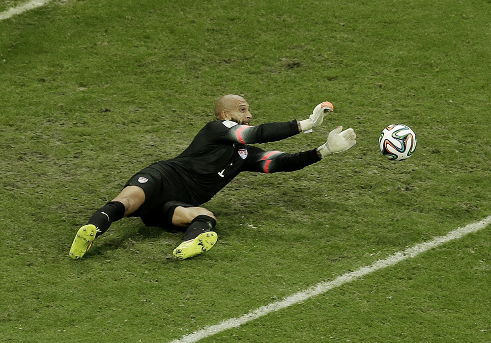 United States goalkeeper Tim Howard makes a save during the World Cup Round of 16 soccer match between Belgium and the USA on Tuesday at the Arena Fonte Nova in Salvador, Brazil. Howard made 16 saves, but the US lost 2-1.