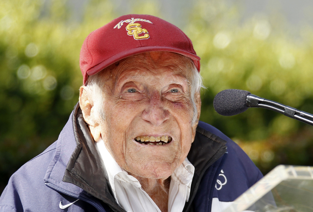 Louis Zamperini appears at a news conference, in Pasadena, Calif., in this May 9, 2014, photo. He died Wednesday at the age of 97.