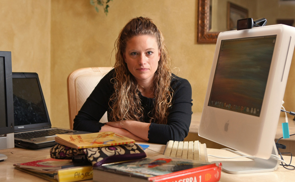 Jennifer Wedel of Fort Worth, Texas is photographed at her home after chatting with President Obama via Google. Wedel challenged President Obama on the H-1B visa issue in 2012, making headlines when she asked him via a public online chat about the number of foreign workers being hired, given that her husband, a semiconductor engineer, couldn’t find work.