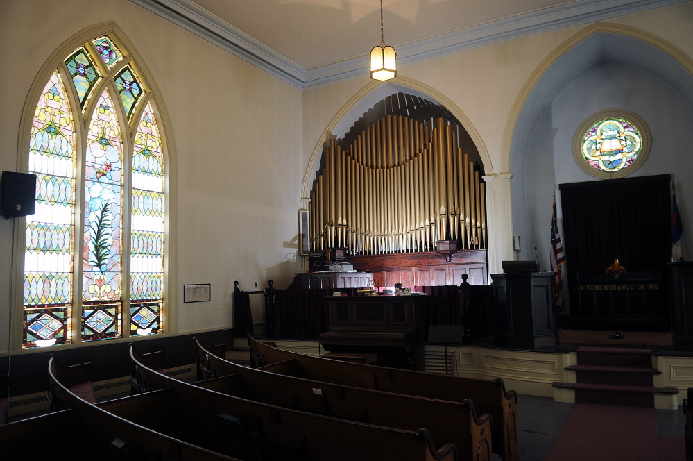 Kristina Nugent and David Boucher plan to keep a pipe organ inside the 19th century church in Gardiner they plan to purchase and convert into a cider brewery. The couple visited the former church on Sunday July 6, 2014.