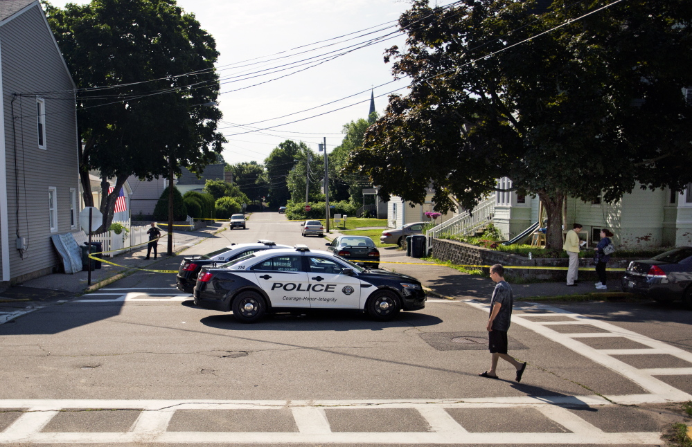 Police block off West Cutts Street at the corner of Western Avenue in Biddeford on Monday as they investigate Sunday’s shooting that left two men dead at 19 Western Ave.