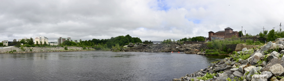 Auburn and Lewiston, separated by the Androscoggin River and pictured on Thursday, June 26, 2014, are discussing merging the cities and presenting it to the community for a local vote.