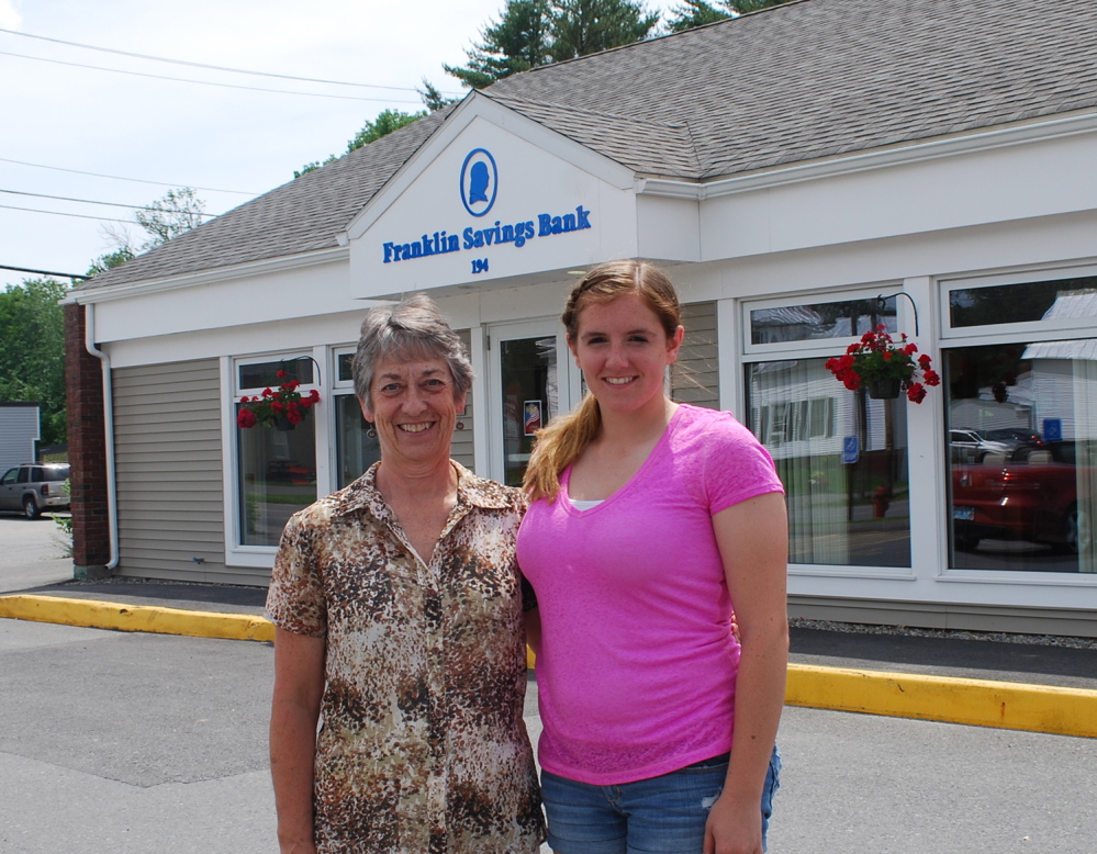 Madison Area Memorial High School Scholar Emily McKenney of Madison, with Skowhegan Branch Manager Sally Dwyer.