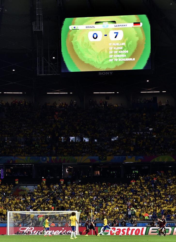 The scoreboard reads 0-7 during Tuesday’s World Cup semifinal match between Brazil and Germany.