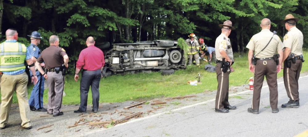 Staff photo by David Leaming.
A high-speed chase that ended Tuesday afternoon on Main Stream Road involved a stolen vehicle carrying stolen scrap metal. The driver and another occupant were taken to the hospital after the vehicle rolled over.