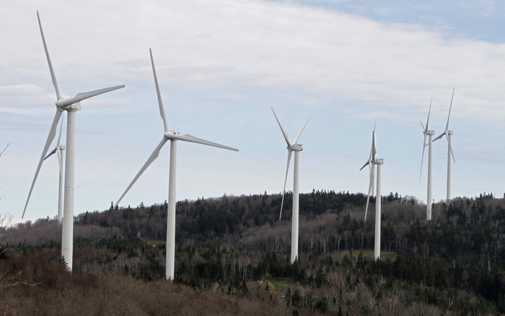 Wind turbines line the hillside at First Wind’s project in Sheffield, Vt. The Boston-based company is appealing the rejection of its proposed project in Penobscot County.
