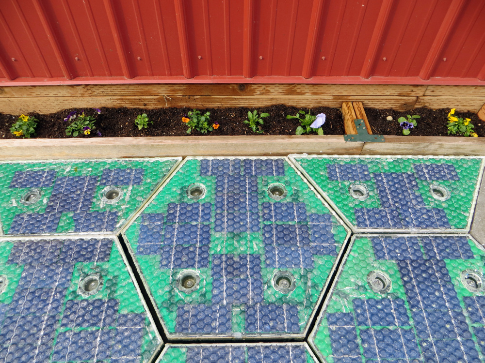A closeup of a prototype solar-panel parking area.