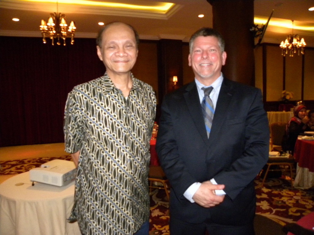 Kennebec County Community College President Richard Hopper, right, appears with his former colleague, Pak Bagyo Moeliodihardjo, an Indonesian education official, during a recent trip to Indonesia to dispense advice to government education officials on how to jump-start a network of community colleges in the country.