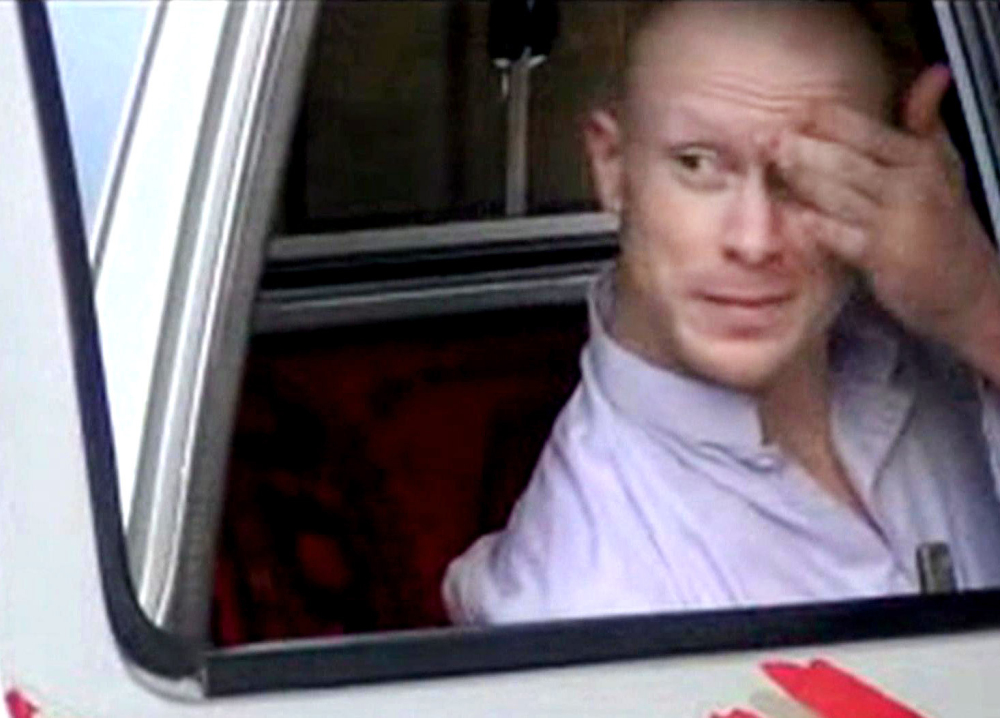Sgt. Bowe Bergdahl, shown here in an image captured from video, sits in a vehicle guarded by the Taliban in eastern Afghanistan before his release to American military personnel on May 31, 2014.